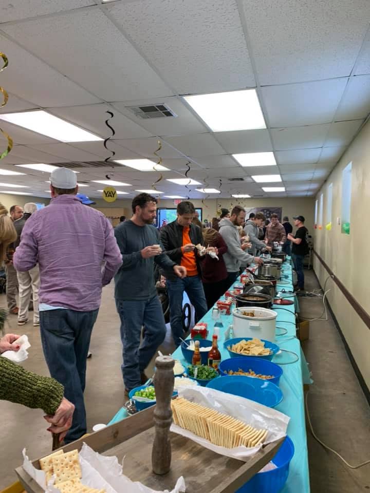 Apache Shores residents gathered outdoors for the 2020 Chili Cookoff, with tables and chili entries set up for the community event.